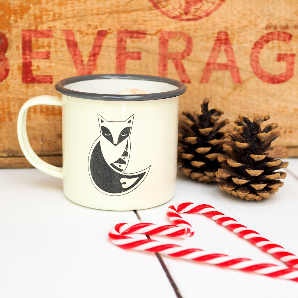 Enamel mug with a fox design