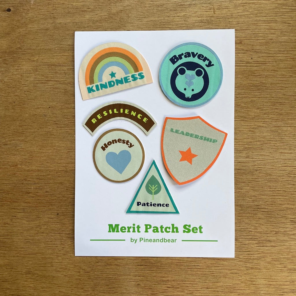 Merit Patches For Children on a white presentation card.
