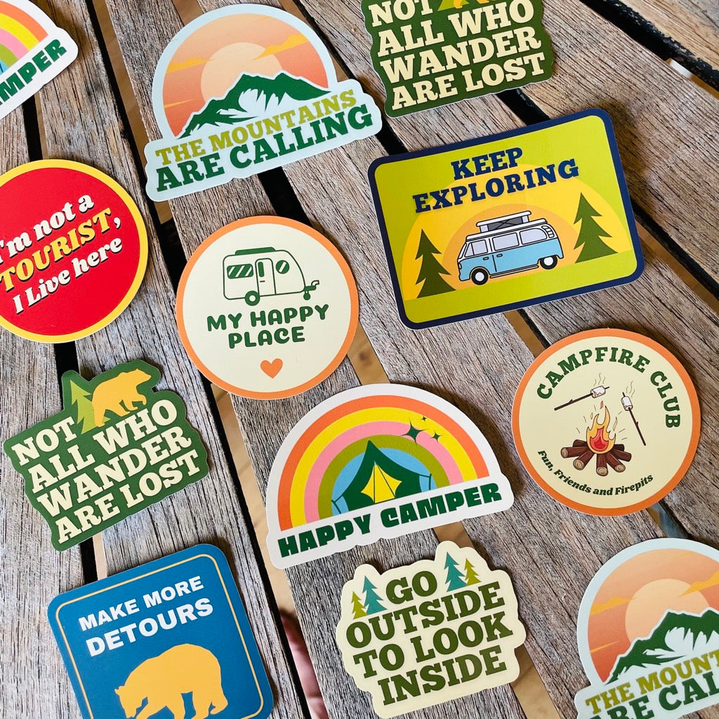 A selection of camping and adventure stickers