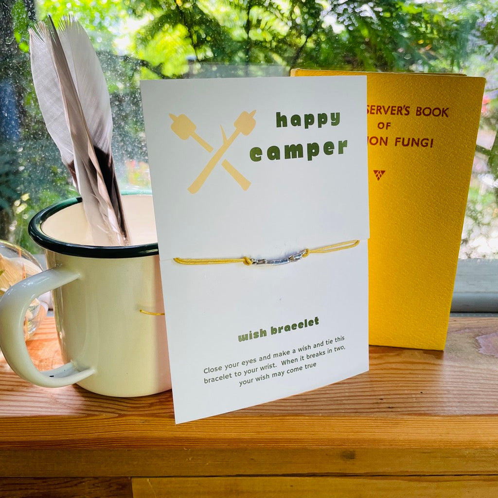 Happy Camper wish Bracelet on its gift card.