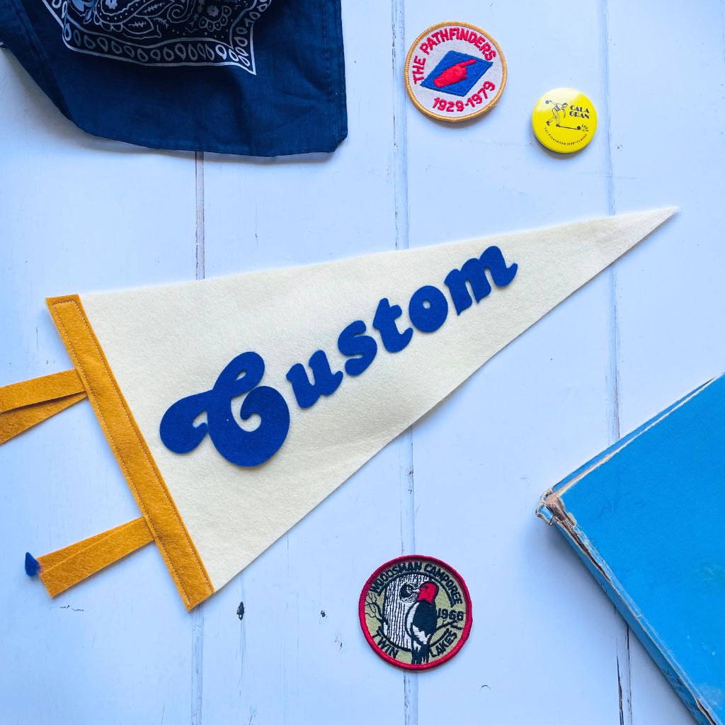 Small custom pennant flag in cream and blue