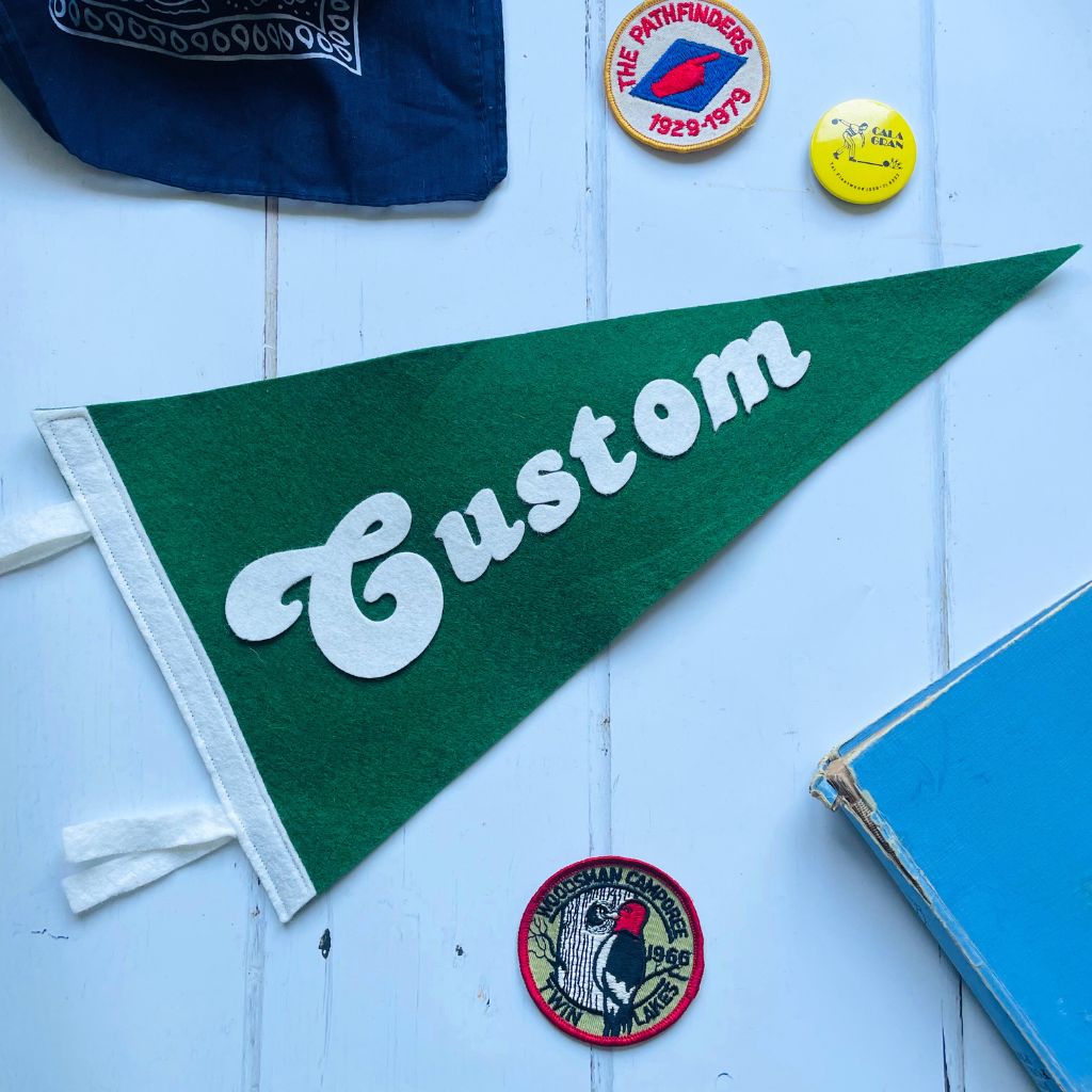 Small custom pennant flag in green and white