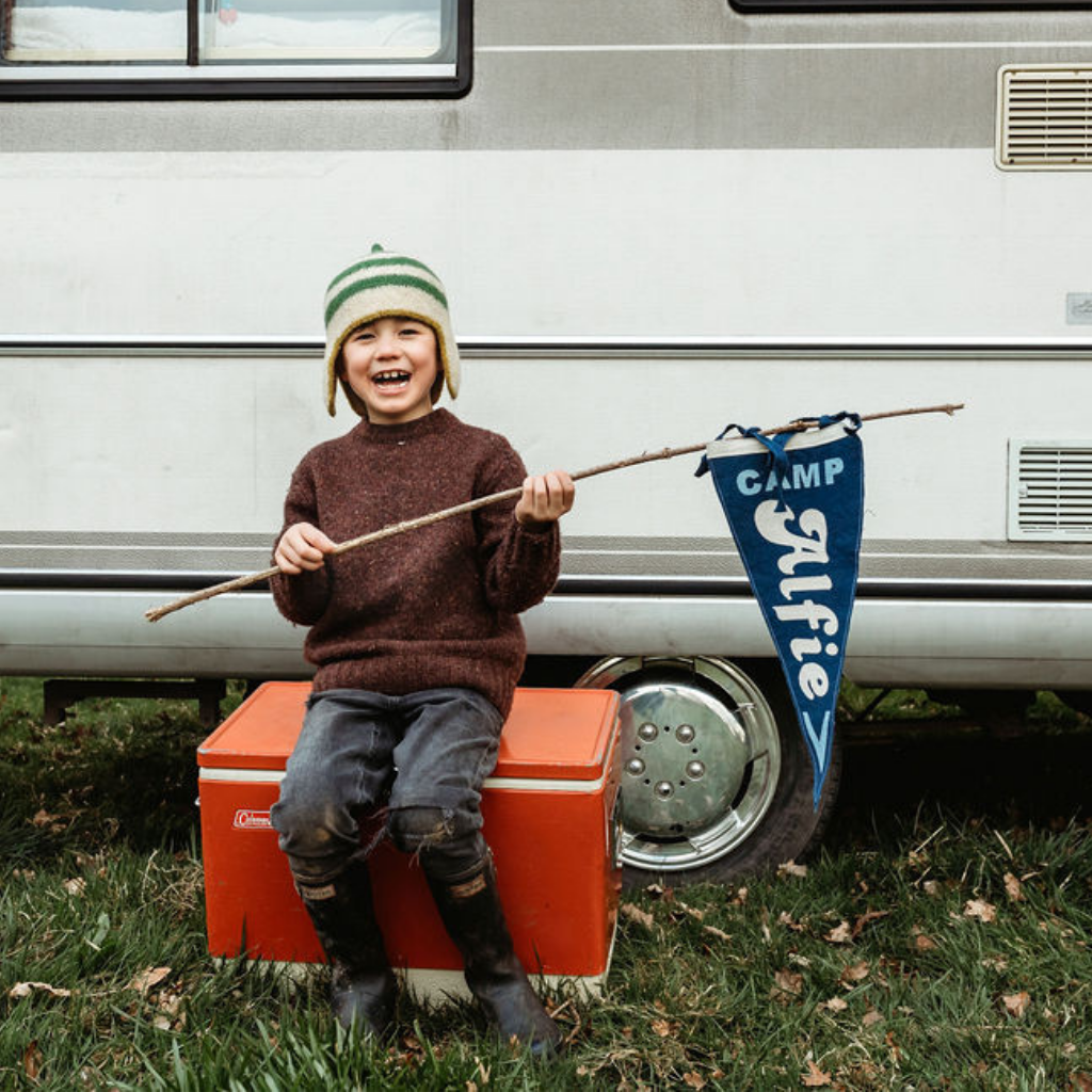 Boy holding personalsed camping flag
